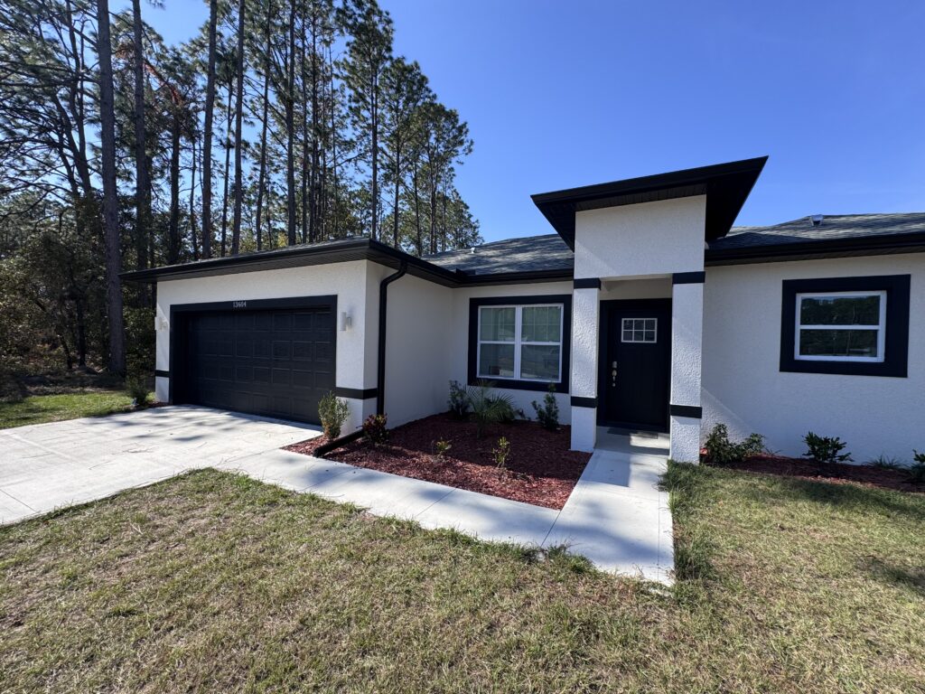 New aluminum soffit and fascia installation on a Florida home exterior