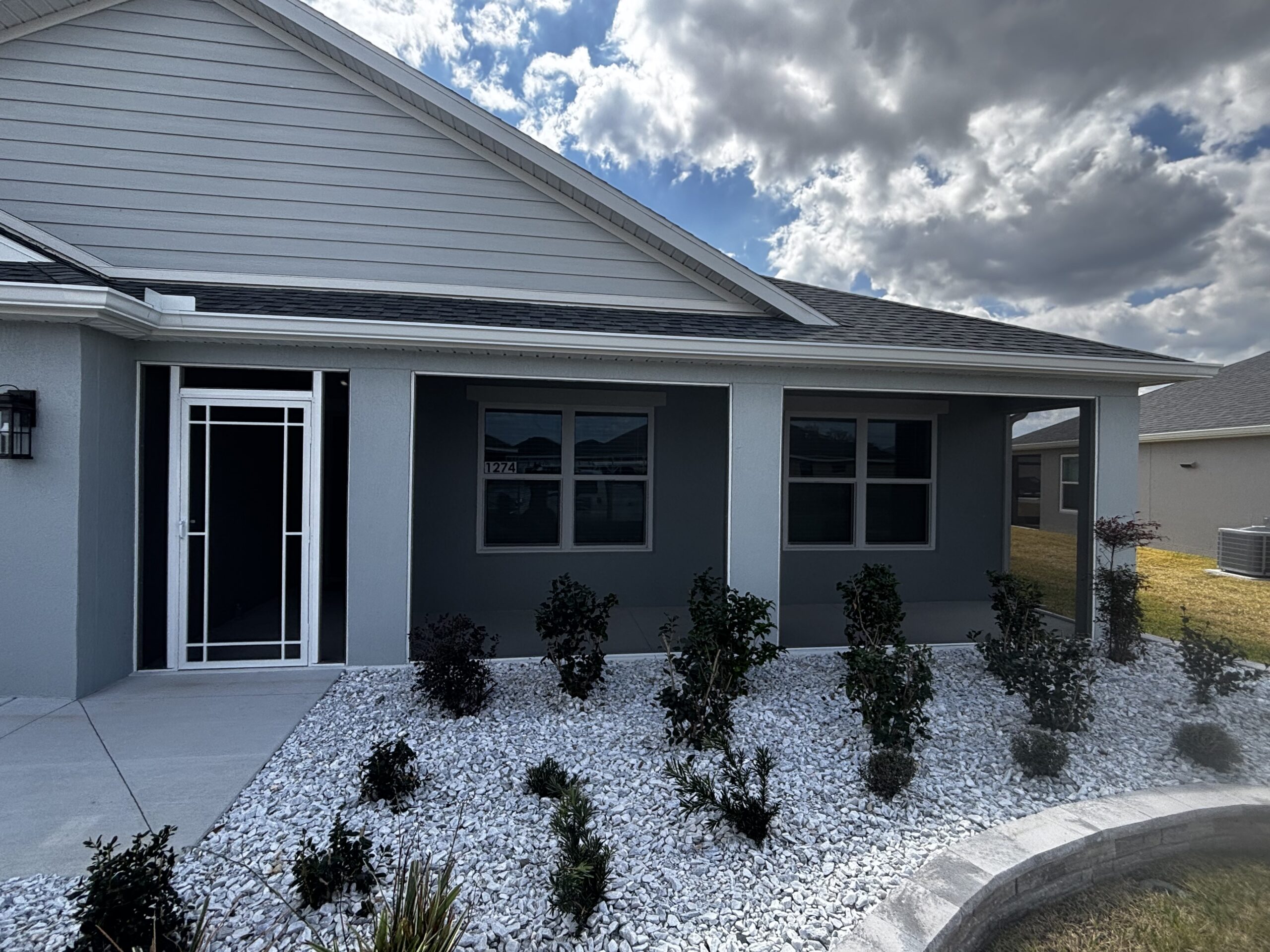Aluminum screened front entry enclosure built by Brownings Aluminum in Marion County, FL
