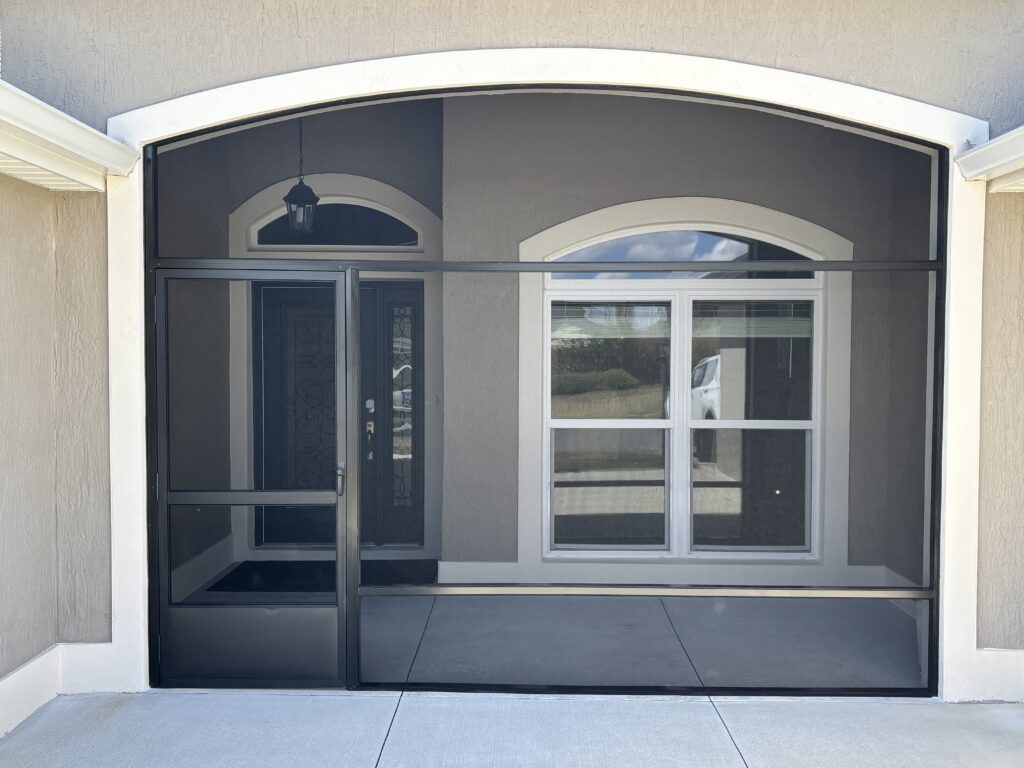 Custom screened front porch enclosure on a Marion County, FL home
